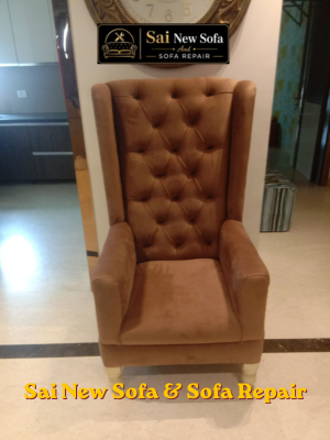 Reviving sofa through meticulous repair, ensuring elegance and comfort.